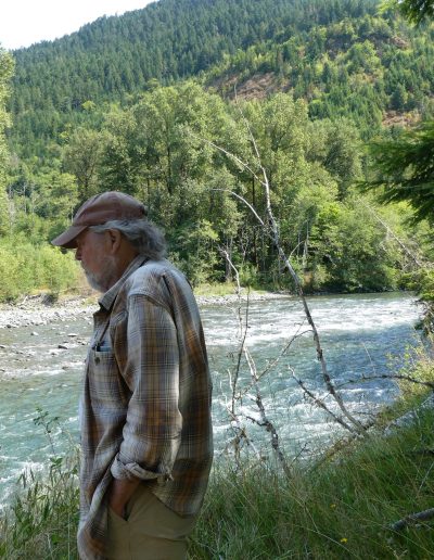 Ken Balcomb near a river